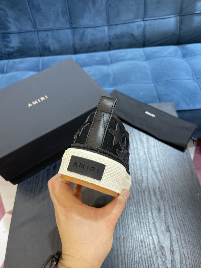 amiri* appliquéd leather and canvas sneakers