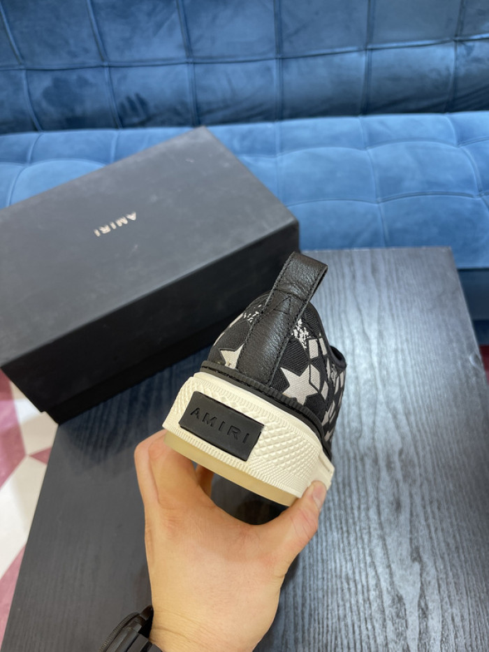 amiri* appliquéd leather and canvas sneakers