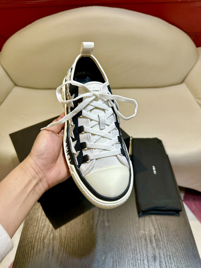 amiri* appliquéd leather and canvas sneakers
