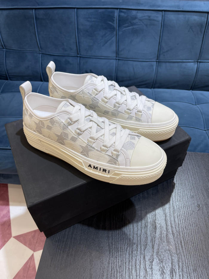 amiri* appliquéd leather and canvas sneakers